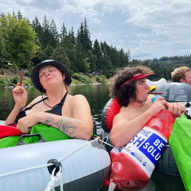 Lisa and Paul floating down a river