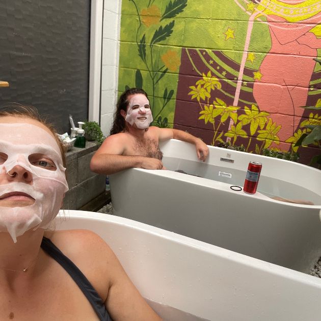 Lisa and Paul in tubs with face masks